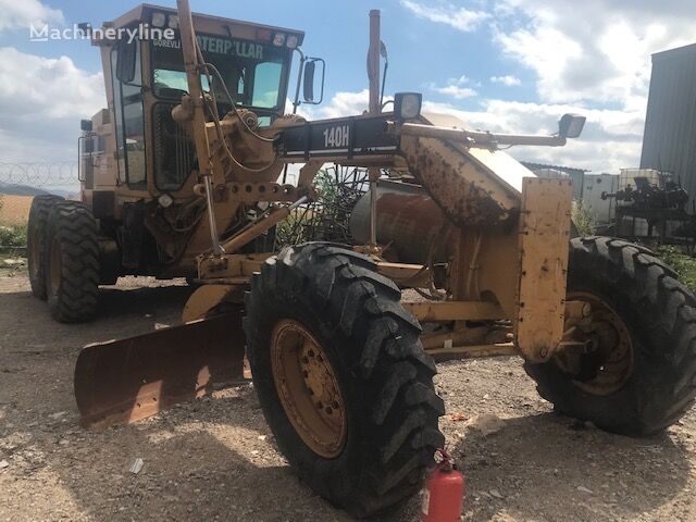 грейдер Caterpillar 140H